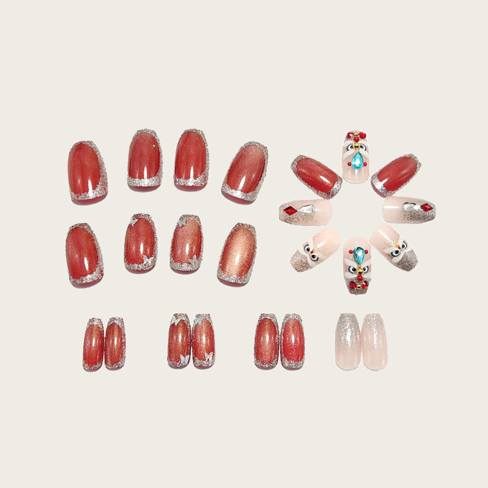 Artificial nails with glitter and gemstone applications Bowlift