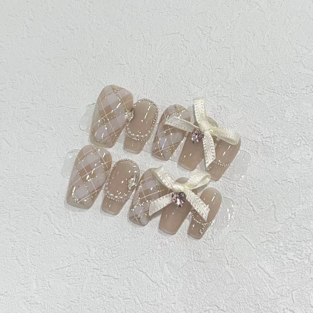 Elegant Press-On Nail Art Set with Ribbons and Gemstone Accents Bowlift