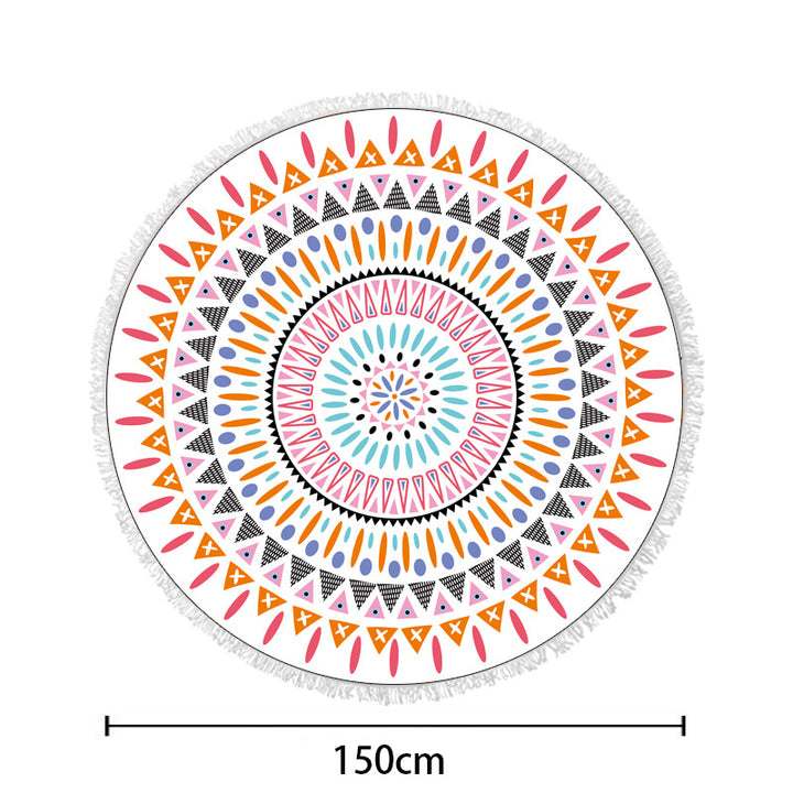 Round beach towel with colorful, tropical floral pattern and fringe decoration Bowlift