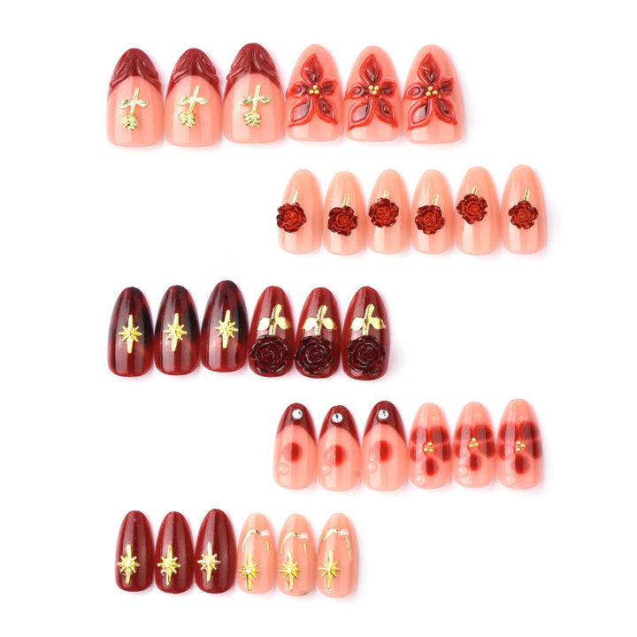 Artificial nail set with elegant floral applications and glamorous accents Bowlift