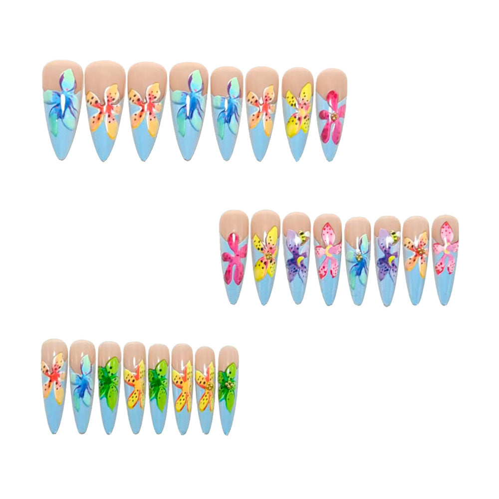 Artificial nails in a playful flower design with glittering accents Bowlift
