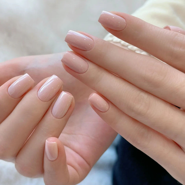 Artificial nails in elegant nude look Bowlift