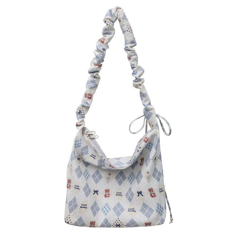 Playful Character-Themed Hobo Bag Bowlift