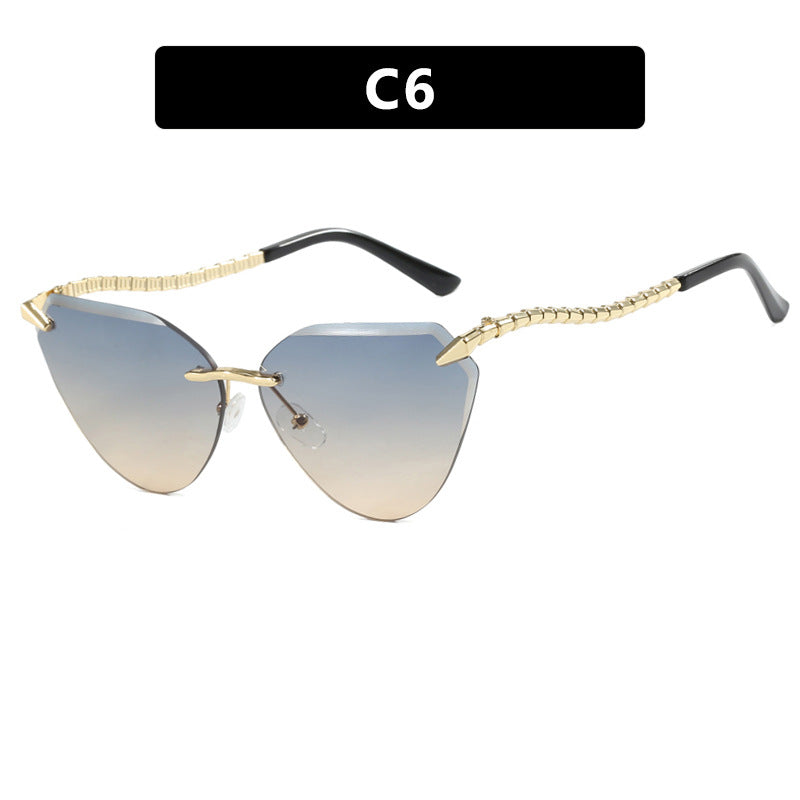 Women's Cat-Eye Sunglasses with unique gold frame design and protective lenses Bowlift