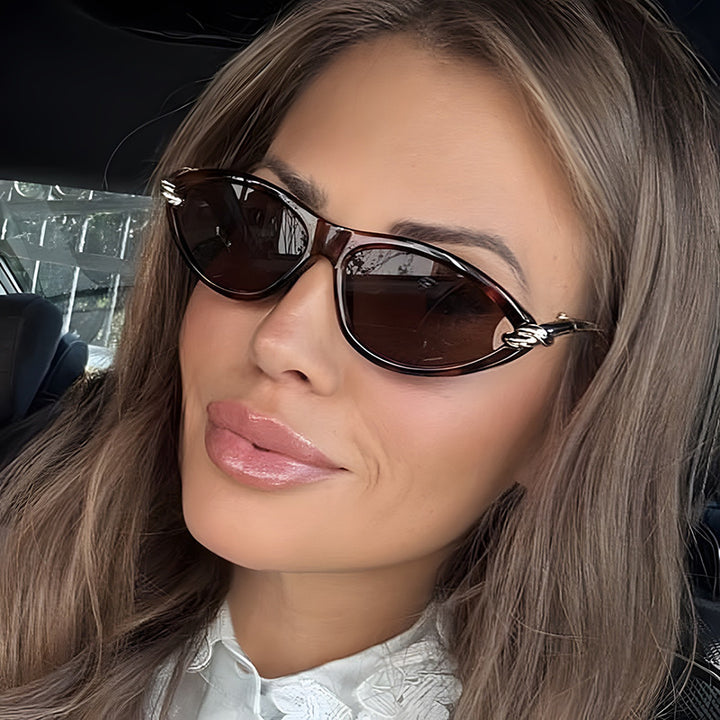 Women's Cat-Eye Sunglasses with Elegant Metal Frame and Protective UV Filter Bowlift