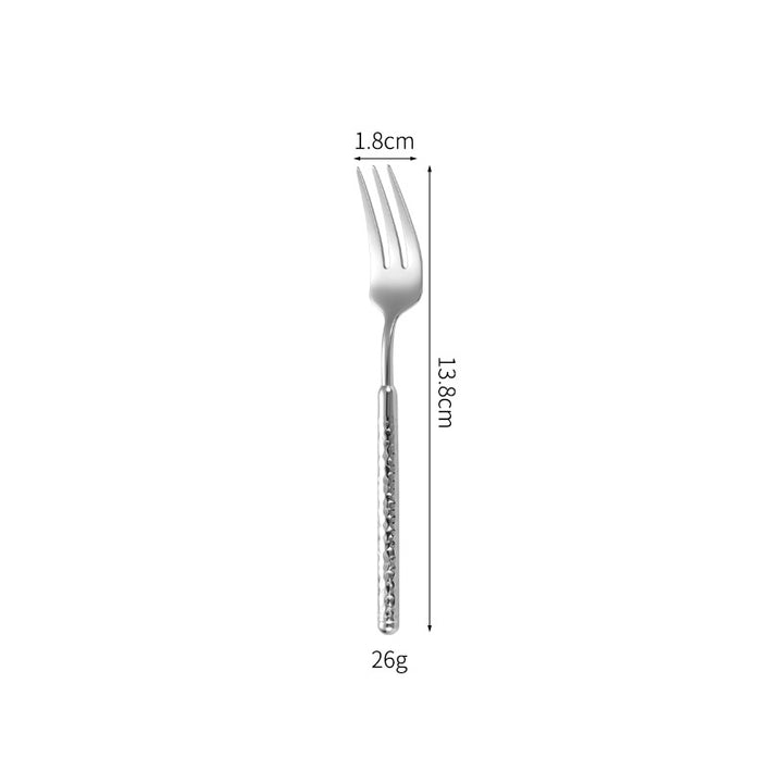Elegant dessert spoon with elaborate handle design Bowlift