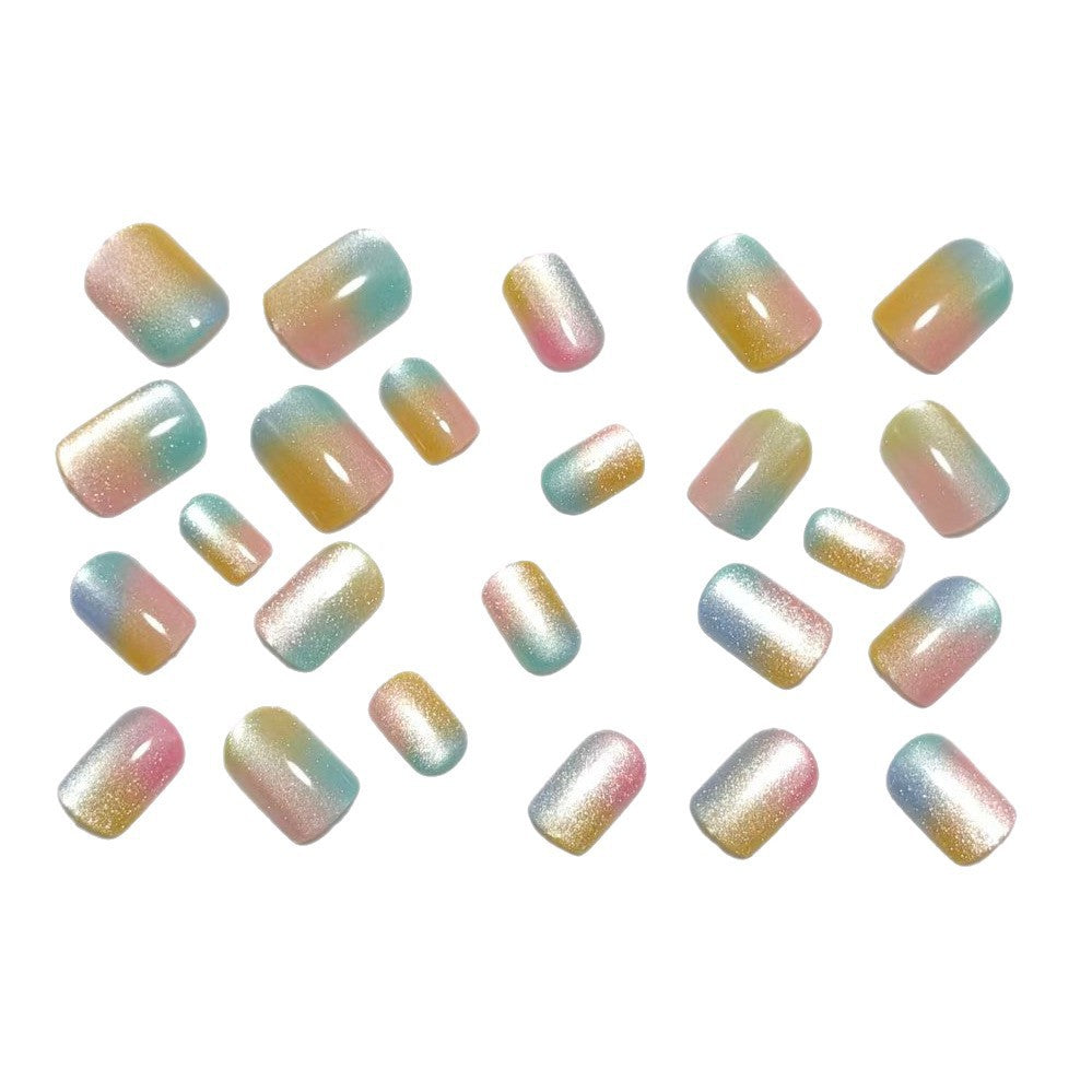 Artificial nails in delicate ombre design with glitter effects Bowlift