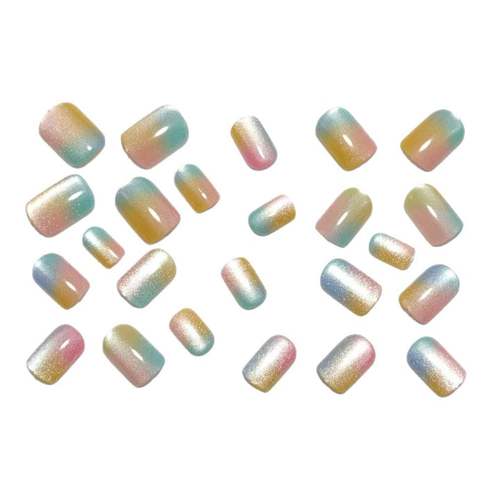 Artificial nails in delicate ombre design with glitter effects Bowlift