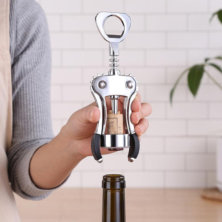 Winged corkscrew with integrated bottle opener and ergonomic rubberized lever handles Bowlift