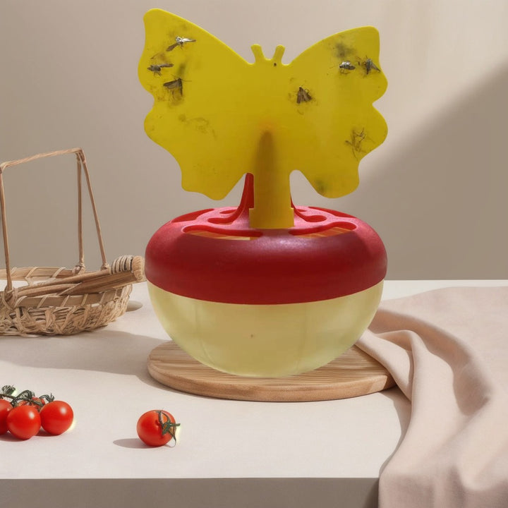 Butterfly-shaped sticky insect trap with refillable liquid reservoir and reusable base Bowlift