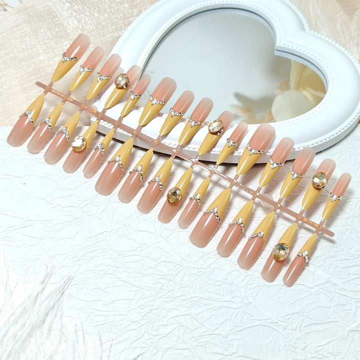 Artificial nails with elegant 3D applications and glitter Bowlift