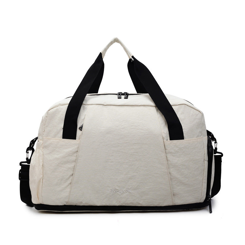 Sporty travel bag with practical outer pockets Bowlift