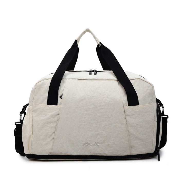 Sporty travel bag with practical outer pockets Bowlift