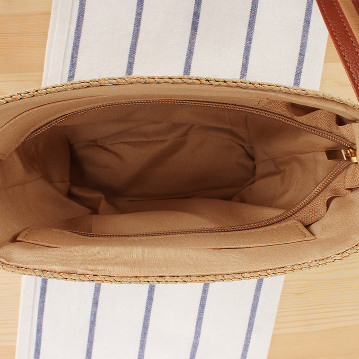 Shoulder bag made of woven natural material with contrasting stripes Bowlift