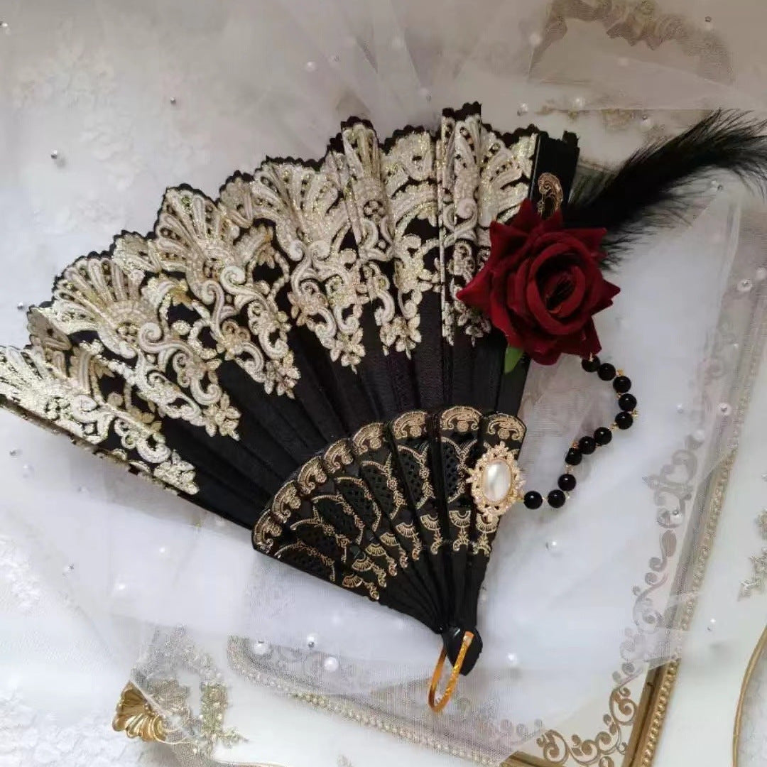 Ladies' elegant hand fan with intricate decorations Bowlift
