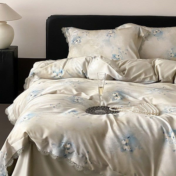 Premium bedding made of fine satin with watercolored floral design and lace edge