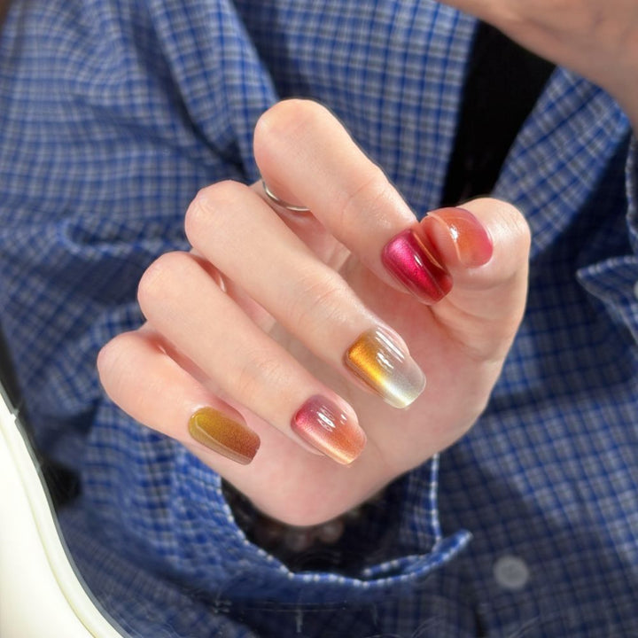 Artificial nails with elegant ombre effect and glitter coating Bowlift