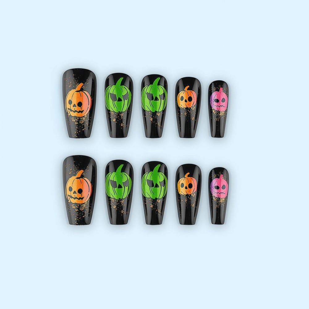 Halloween-style artificial nails with graphic pumpkin designs Bowlift