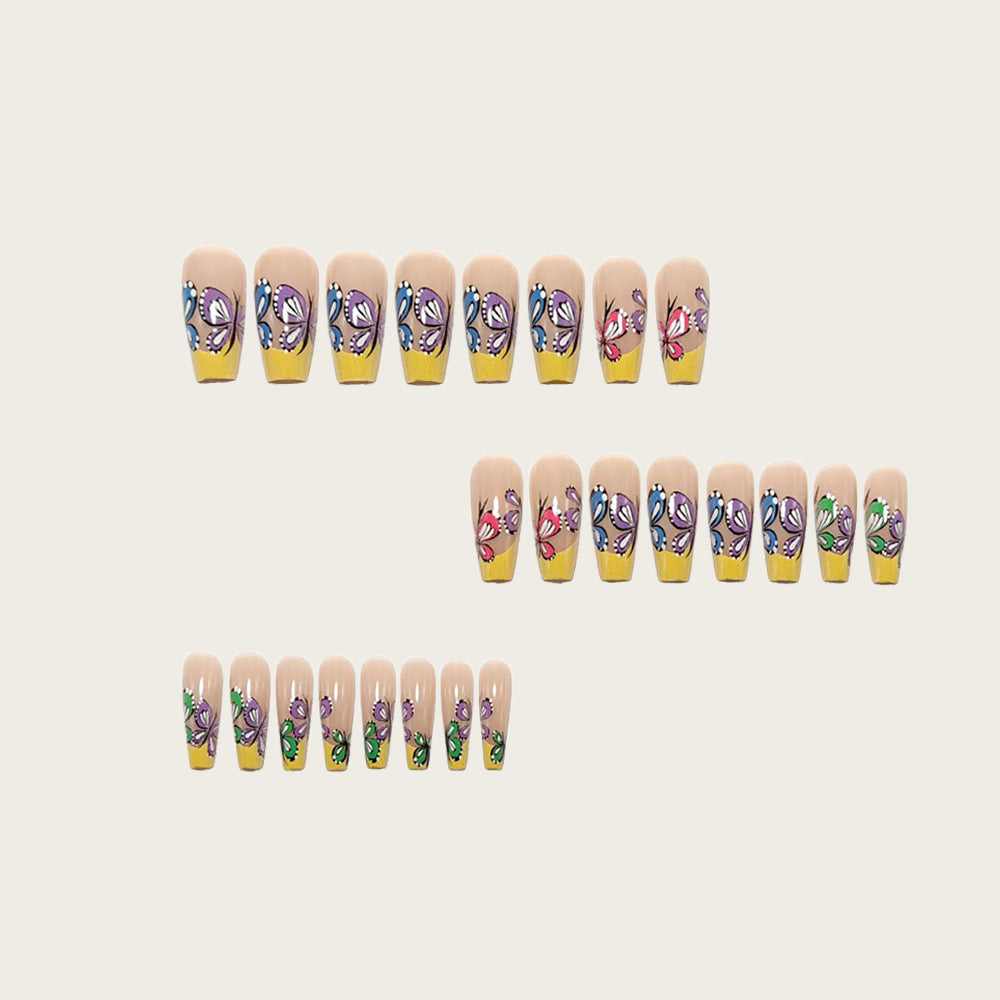 Nail set with intricate butterfly design Bowlift