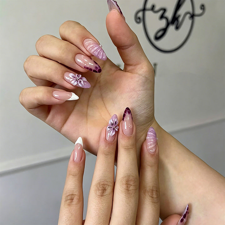 Artificial nail set with elegant ombre design and floral accents Bowlift