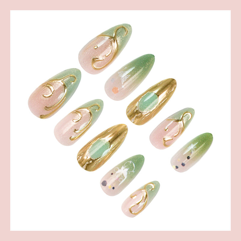 Nail art set with elegant gold accents and floral designs Bowlift