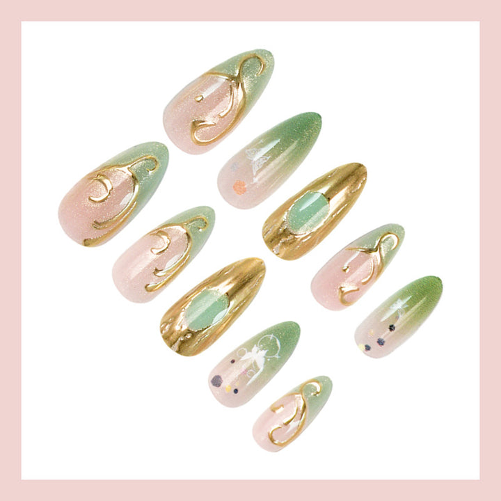 Nail art set with elegant gold accents and floral designs Bowlift