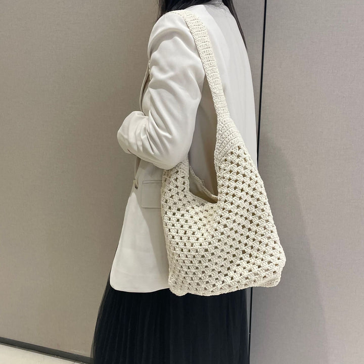 Hand-knotted shoulder bag in modern net design Bowlift