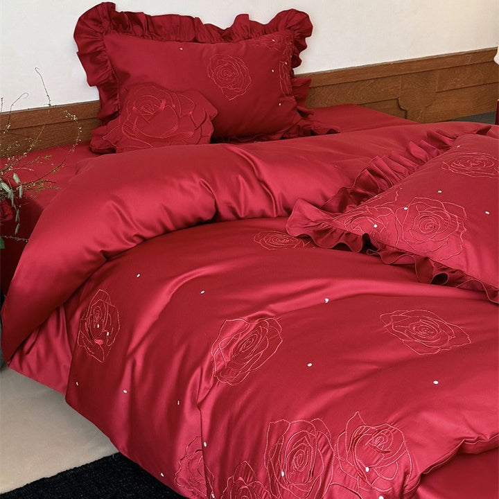 Satin bedding set with rose embroidery, ruffled pillow and decorative pillow Bowlift
