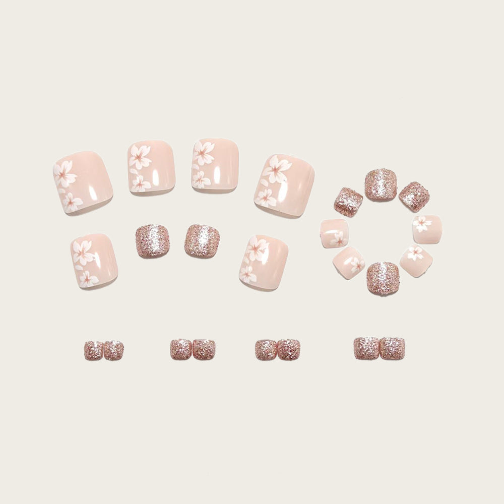 Artificial nail set with floral and glittering accents Bowlift