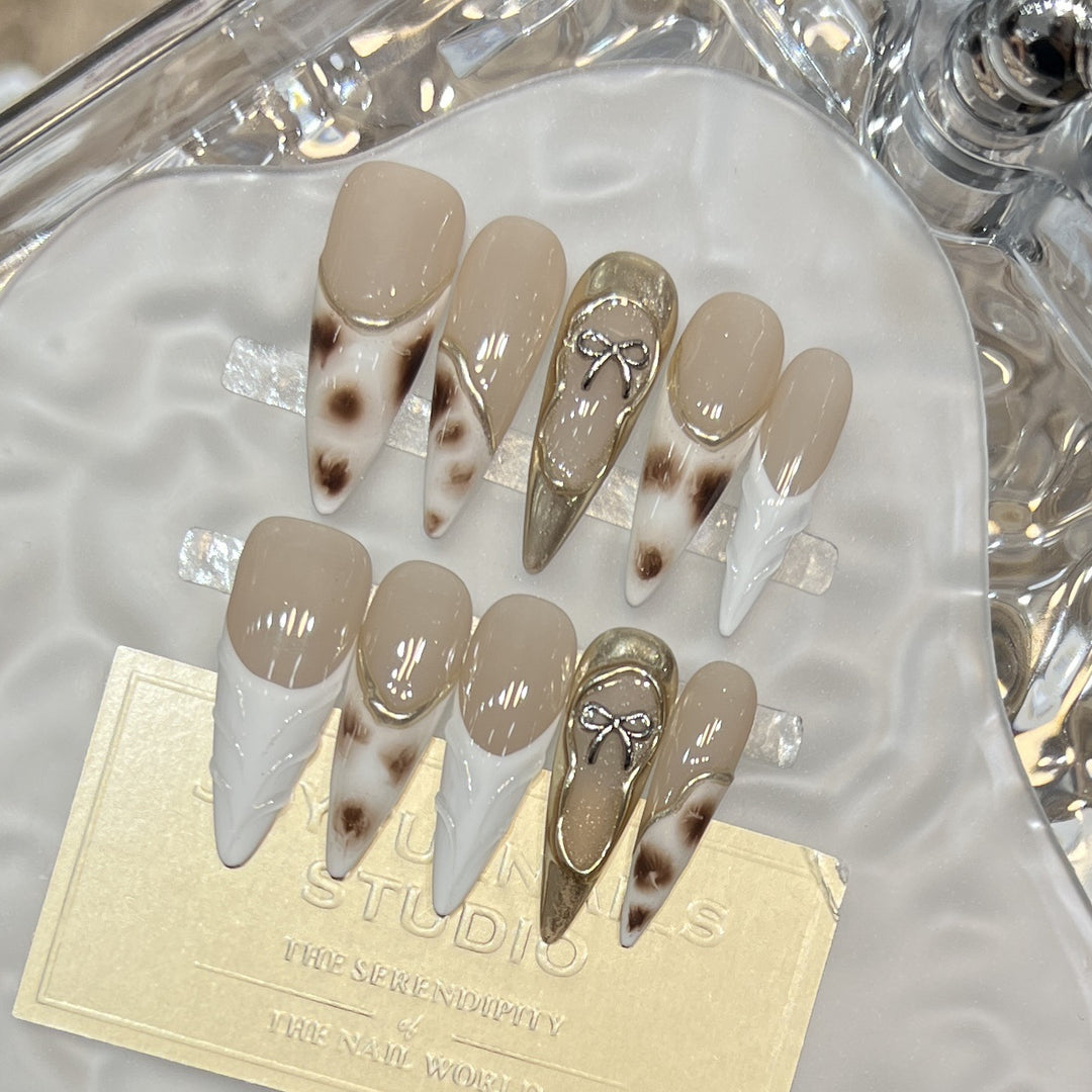 Decorative Stiletto Press-On Nail Art Set with Unique Design Elements Bowlift