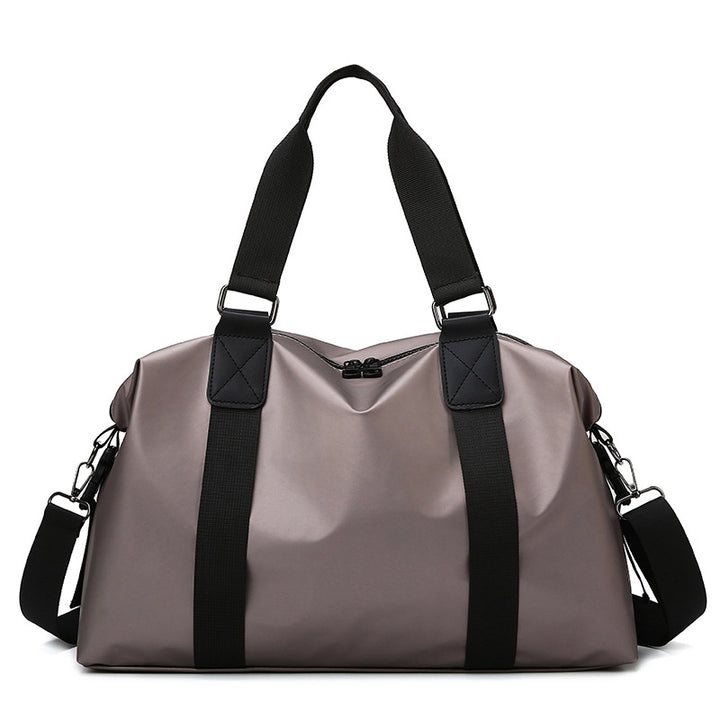 Sporty travel bag with water-repellent properties and ergonomic carrying handles Bowlift