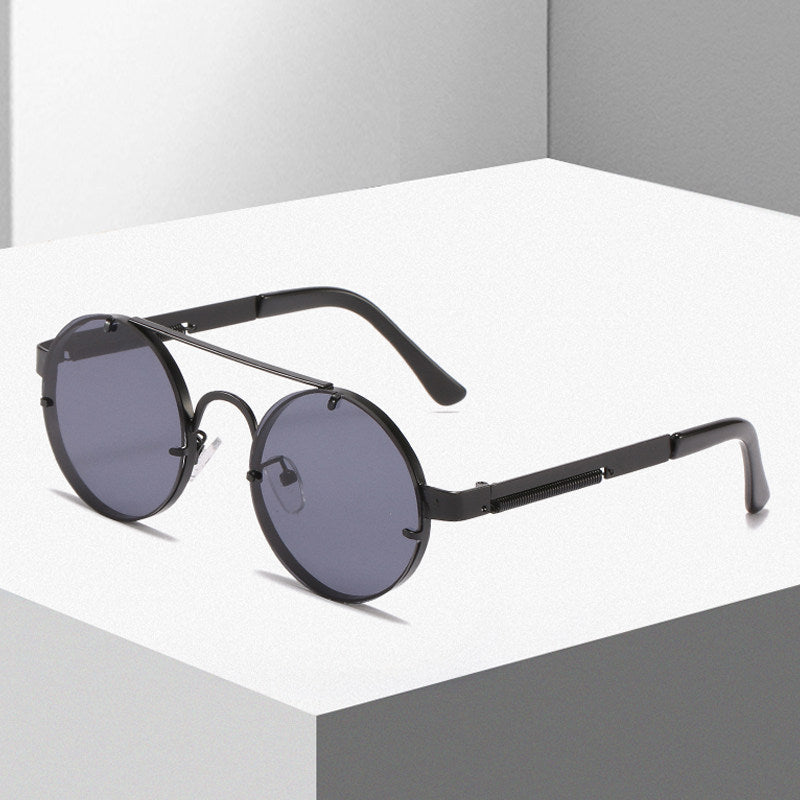 Women's round designer sunglasses with innovative metal frame and protective lenses Bowlift