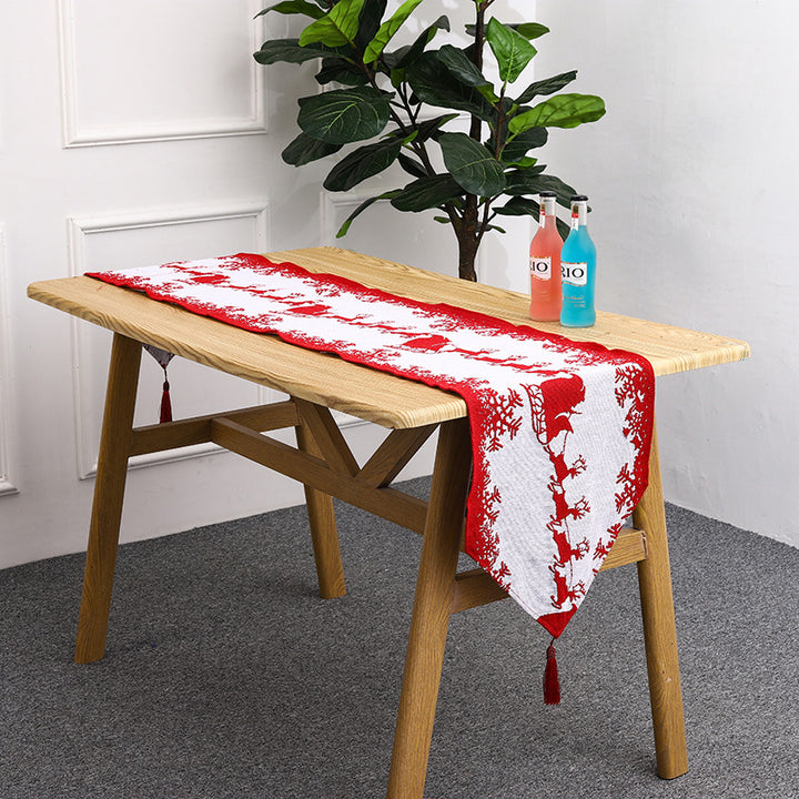 Christmas table runner with reindeer motif Bowlift
