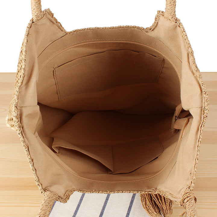 Elegant straw bag with practical tassels Bowlift