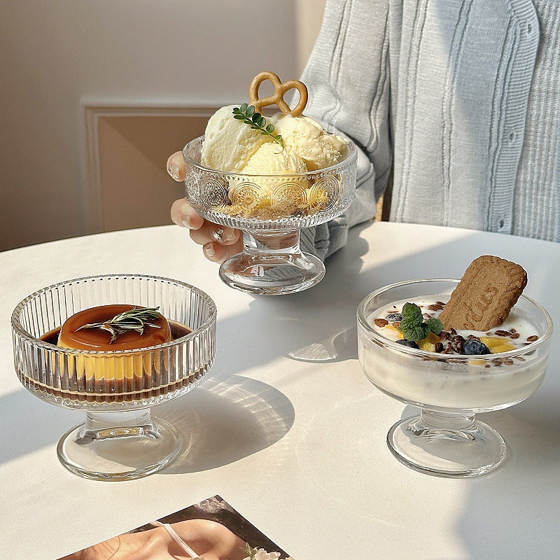 Footed glass dessert bowl with wide rim pedestal base for serving and display Bowlift
