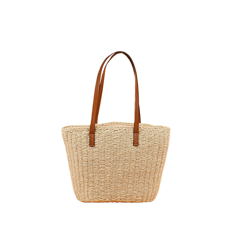 Handbag made of hand-woven natural material with sturdy leather handles Bowlift