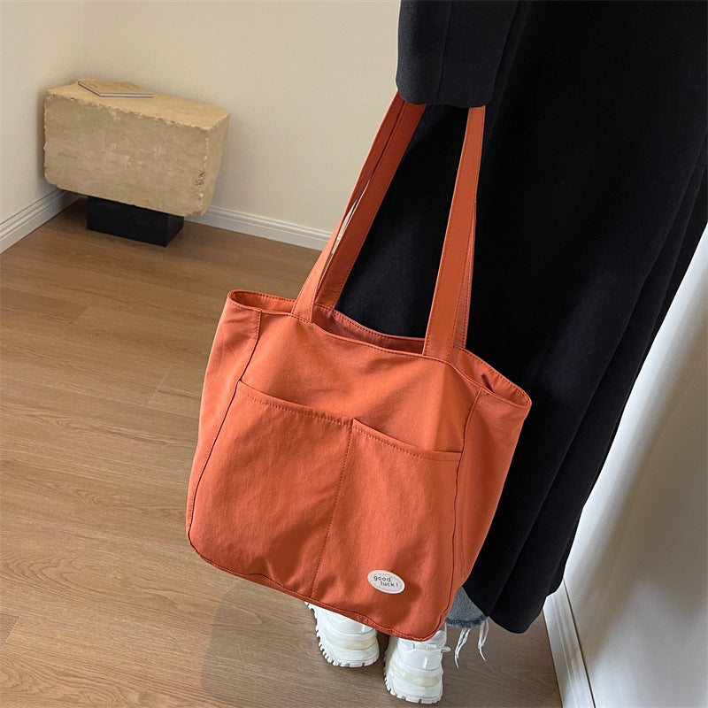 Multi-Pocket Utility Tote Bowlift