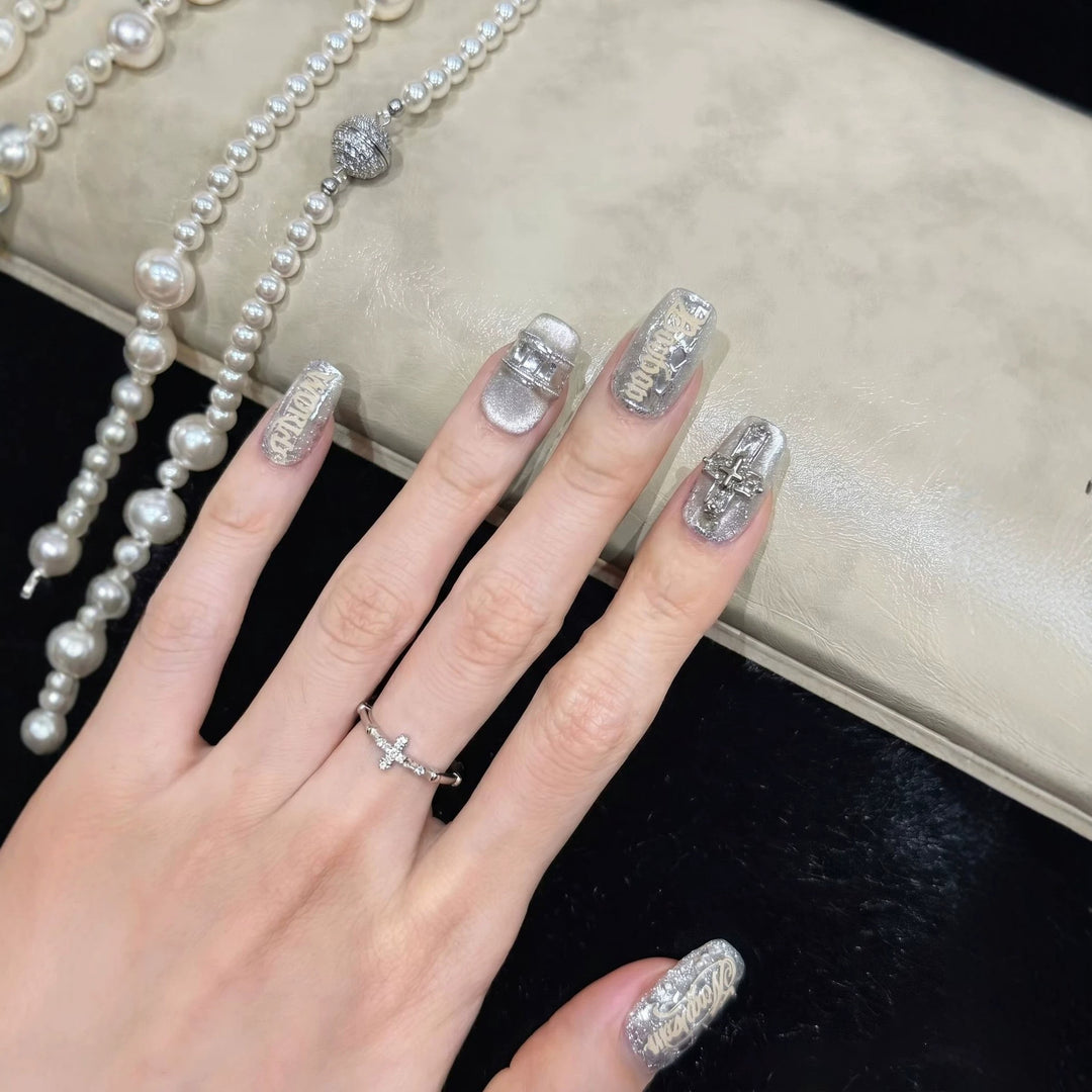 Metallic Press-On Nail Set with Decorative Silver Accents Bowlift
