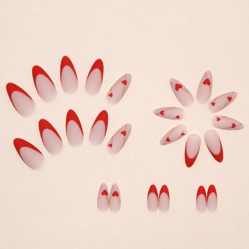 Heart-Embellished Stiletto Nail Art Bowlift