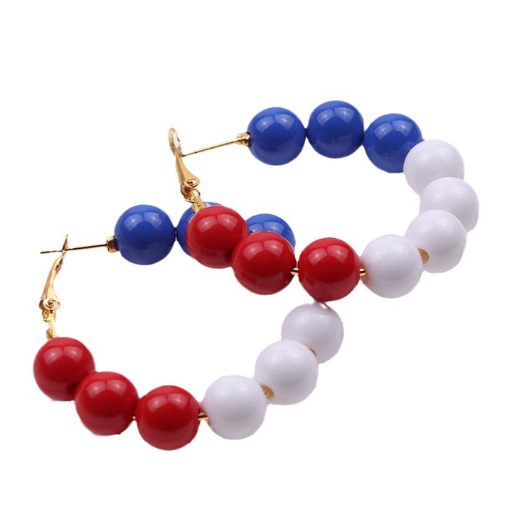 Women's pearl hoop earrings with large acrylic balls and secure clasp closure Bowlift