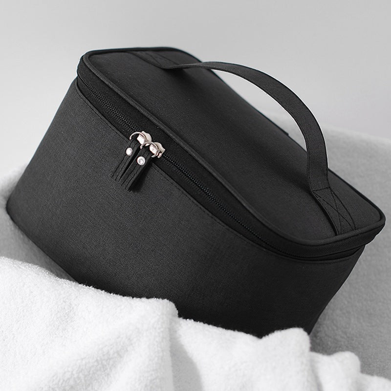 Cosmetic transport bag with thoughtful interior layout Bowlift