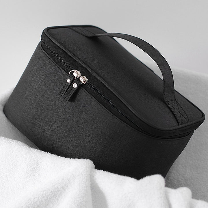 Cosmetic transport bag with thoughtful interior layout Bowlift