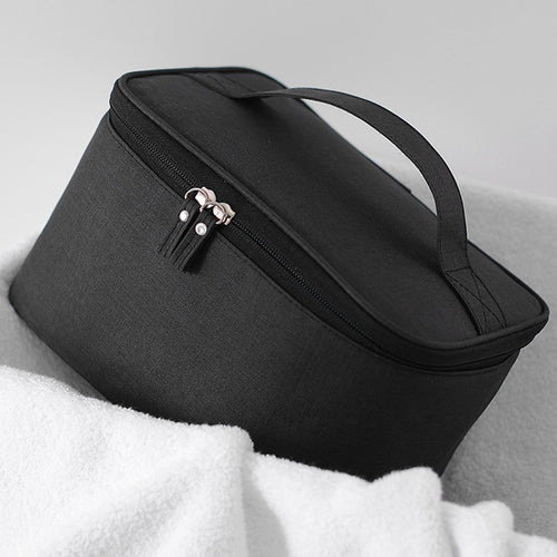 Cosmetic transport bag with thoughtful interior layout Bowlift