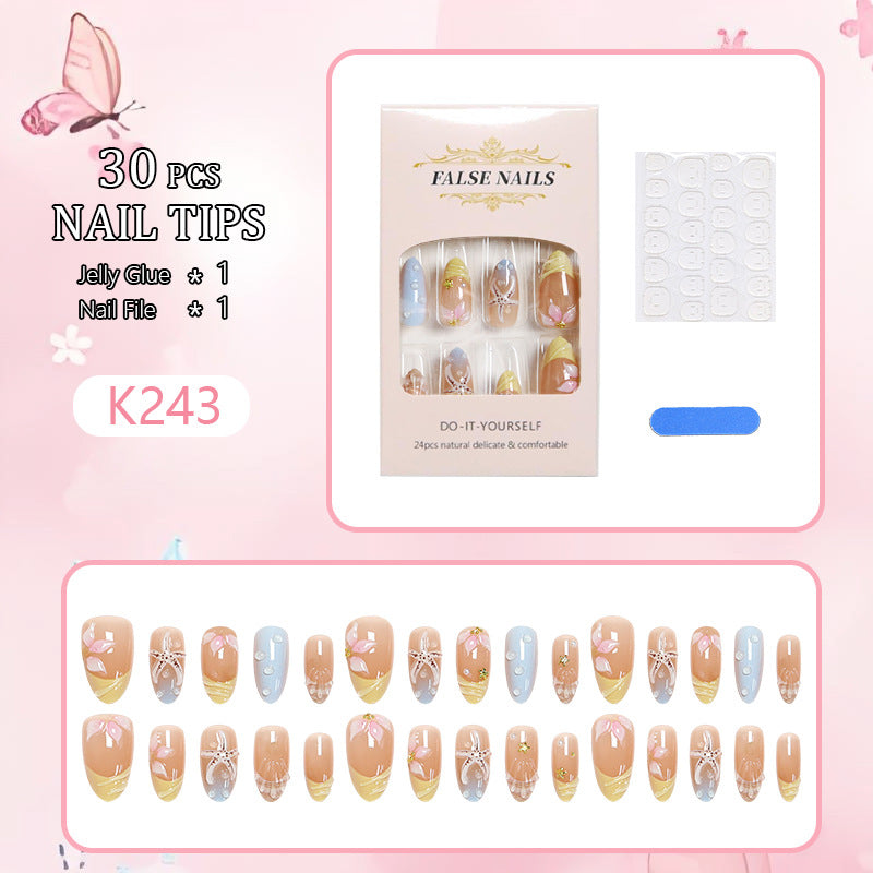 Artificial nail set with floral motifs and glitter accents Bowlift