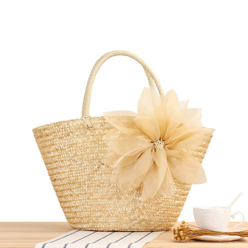 Elegant straw bag with floral accents Bowlift