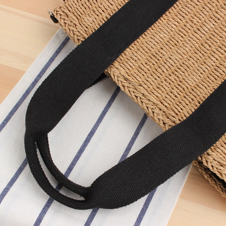 Handbag made of braided natural material with adjustable shoulder strap Bowlift