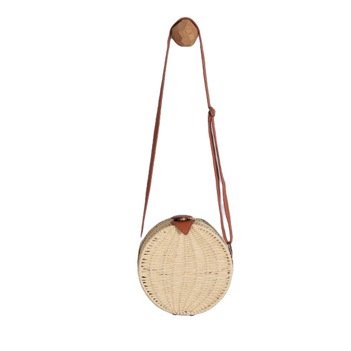 Round basket bag with leather accents Bowlift