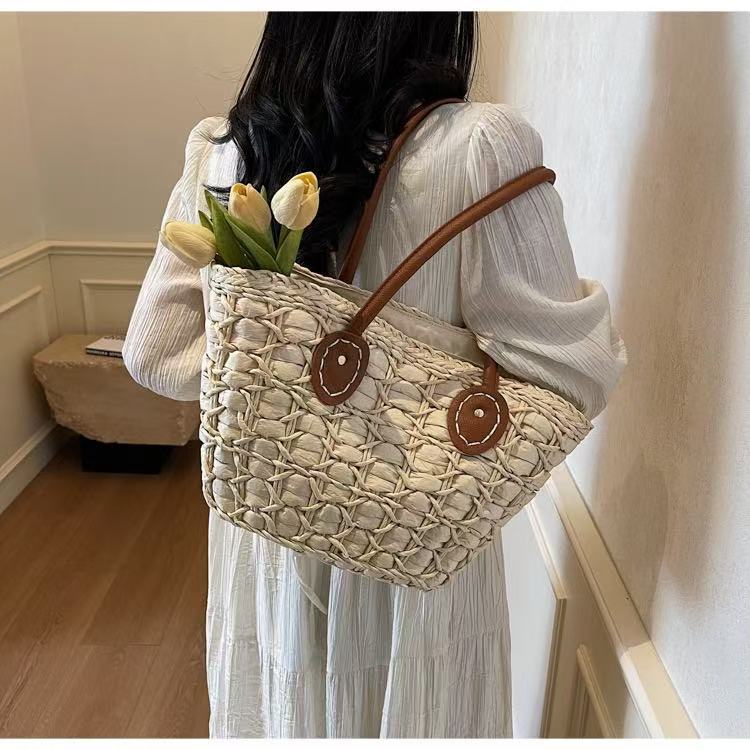 Handcrafted basket bag with elegant leather accents Bowlift