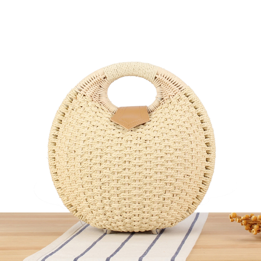 Round straw bag with elegant leather handle Bowlift