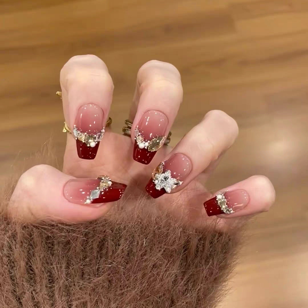 Artistic Long Stiletto Press-On Nails with Floral and Gemstone Accents Bowlift